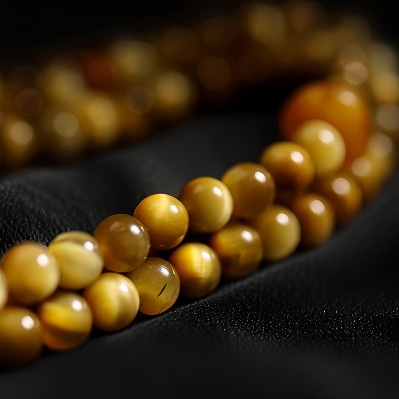 سوار يد من خرز مالا 108 حبة من عين النمر مع شرابة دورجي 108 Mala Beads Tiger Eye Dorje Tassel Bracelet