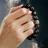 سوار يد من حجر الأوبسيديان الذهبي مع نقش "أوم ماني بادمي هوم" Gold Sheen Obsidian Om Mani Padme Hum Bracelet