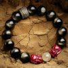 سوار يد من حجر الأوبسيديان الذهبي مع نقش "أوم ماني بادمي هوم" Gold Sheen Obsidian Om Mani Padme Hum Bracelet