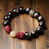سوار يد من حجر الأوبسيديان الذهبي مع نقش "أوم ماني بادمي هوم" Gold Sheen Obsidian Om Mani Padme Hum Bracelet