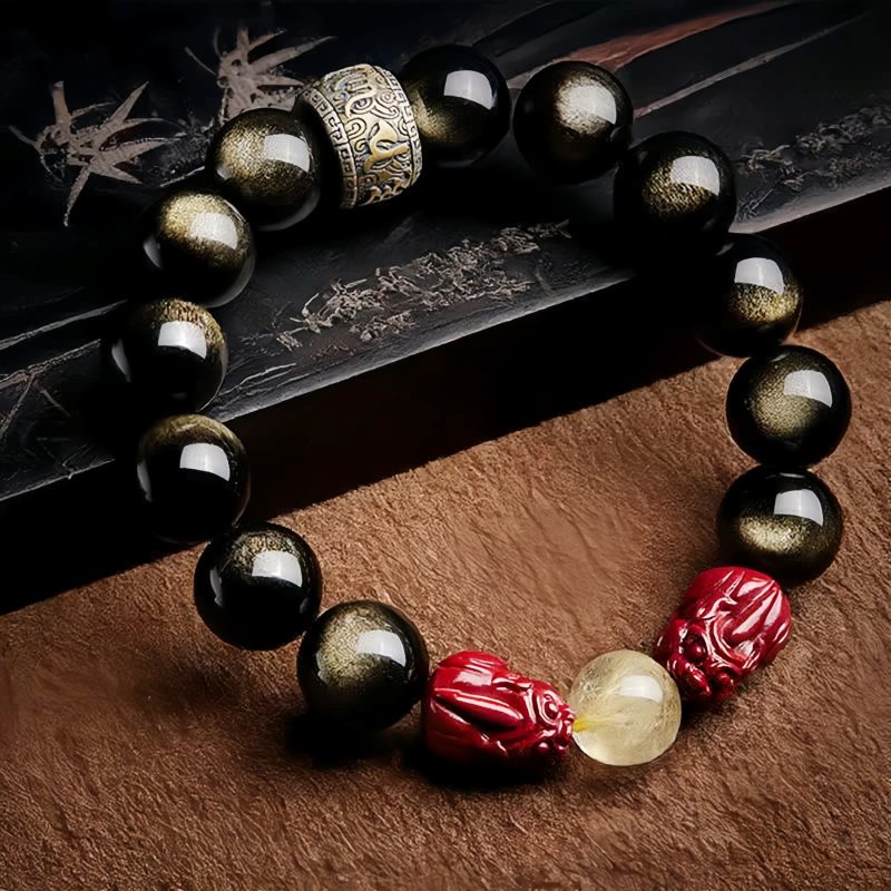 سوار يد من حجر الأوبسيديان الذهبي مع نقش "أوم ماني بادمي هوم" Gold Sheen Obsidian Om Mani Padme Hum Bracelet