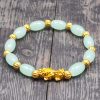 Pulsera de la Fortuna con Pixiu Dorado y Ágata Roja Golden Pixiu Wealth Bracelet with Red Agate