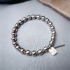 Pulsera de Buena Suerte con Acero de Titanio para el Equilibrio Titanium Steel Balance Good Luck Bracelet