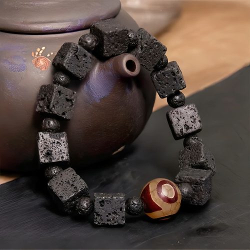 Pulsera Curativa con Cuentas Dzi y Roca Volcánica Pulsera Curativa con Cuentas Dzi y Roca Volcánica