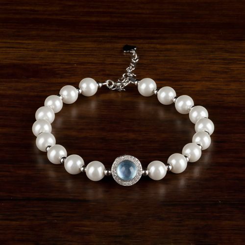 Pulsera Tibetana de Plata 925 con Calcedonia Azul y Perla: Una Joya Curativa Pulsera Tibetana de Plata 925 con Calcedonia Azul y Perla: Una Joya Curativa