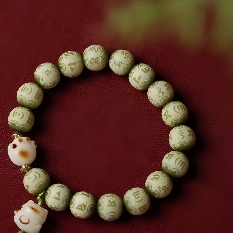 Pulsera de sabiduría con semillas de Bodhi, pata de gato y dije Om Mani Padme Hum Bodhi Seed Cat Paw Wisdom Bracelet with Om Mani Padme Hum Charm
