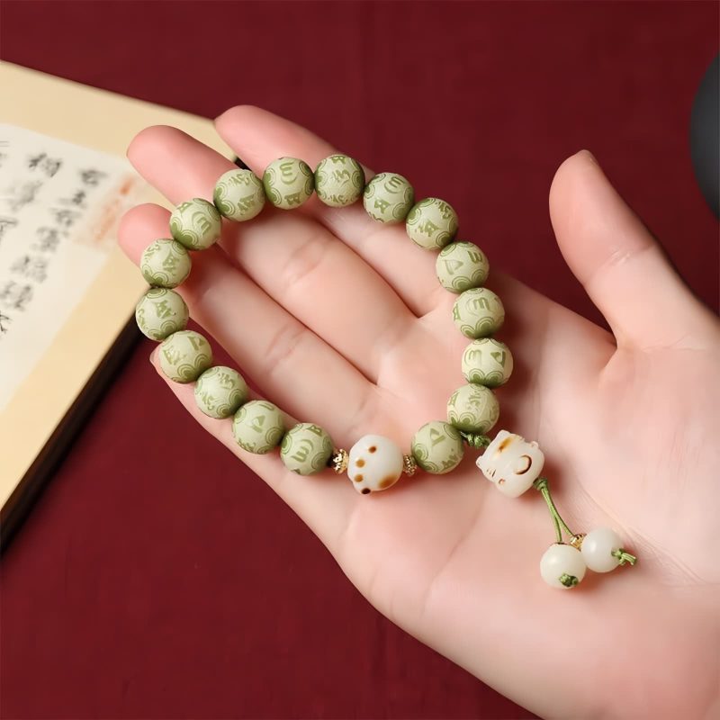 Pulsera de sabiduría con semillas de Bodhi, pata de gato y dije Om Mani Padme Hum Bodhi Seed Cat Paw Wisdom Bracelet with Om Mani Padme Hum Charm