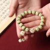 Pulsera de sabiduría con semillas de Bodhi, pata de gato y dije Om Mani Padme Hum Bodhi Seed Cat Paw Wisdom Bracelet with Om Mani Padme Hum Charm