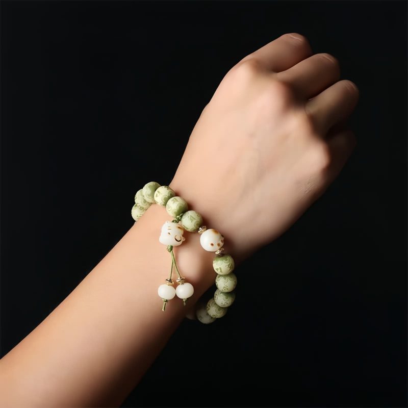 Pulsera de sabiduría con semillas de Bodhi, pata de gato y dije Om Mani Padme Hum Bodhi Seed Cat Paw Wisdom Bracelet with Om Mani Padme Hum Charm