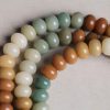 手彫り菩提樹種子平和ブレスレット Hand-Carved Bodhi Seed Peace Bracelet