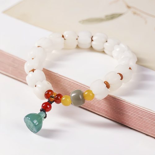 Pulsera de Loto con Semillas de Bodhi Naturales y Ágata Roja Pulsera de Loto con Semillas de Bodhi Naturales y Ágata Roja