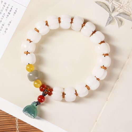 Pulsera de Loto con Semillas de Bodhi Naturales y Ágata Roja Pulsera de Loto con Semillas de Bodhi Naturales y Ágata Roja