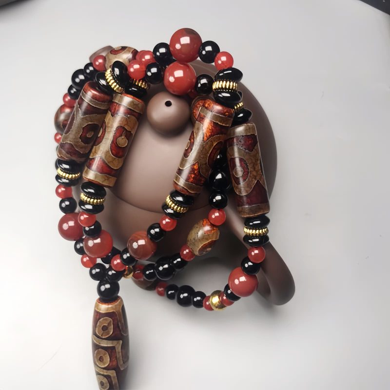 Collar con Ojo de Tigre de Nueve Ojos y Ágata Roja Nine-Eye Dzi Bead Red Agate Necklace