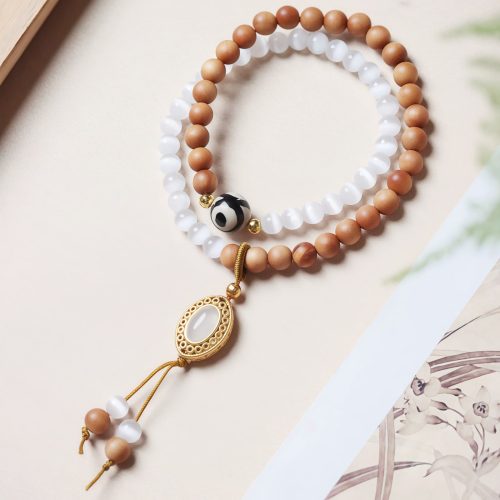 Pulsera de Protección Dzi Ojo de Gato con Sándalo Pulsera de Protección Dzi Ojo de Gato con Sándalo