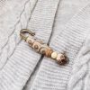 Broche de Semilla de Bodhi con Dzi de Nueve Ojos Tibetano Tibetan Nine-Eye Dzi Bead Bodhi Seed Brooch