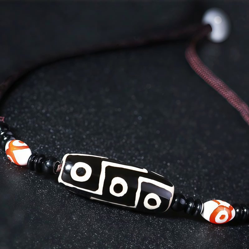 قلادة حماية من حجر dzi التبتي ذي التسع عيون Agate Tibetan Dzi Bead Protection Necklace