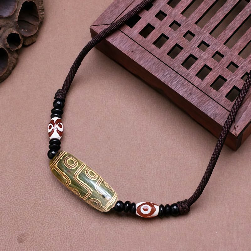 قلادة حماية من حجر dzi التبتي ذي التسع عيون Agate Tibetan Dzi Bead Protection Necklace