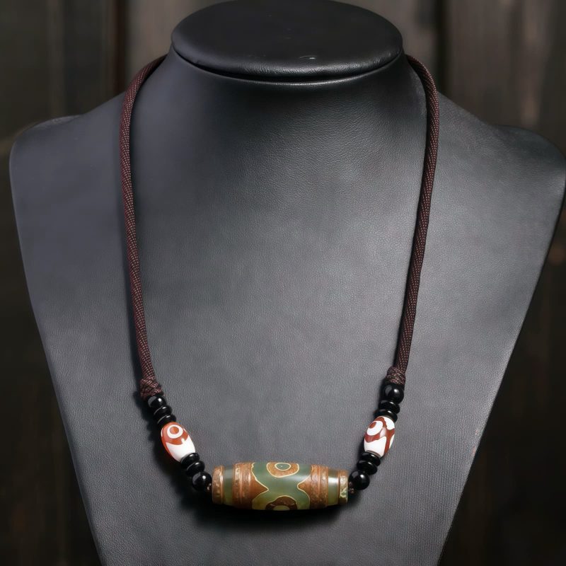 قلادة حماية من حجر dzi التبتي ذي التسع عيون Agate Tibetan Dzi Bead Protection Necklace