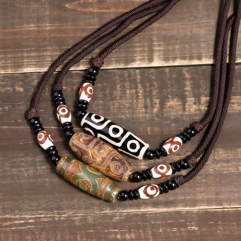 قلادة حماية من حجر dzi التبتي ذي التسع عيون Agate Tibetan Dzi Bead Protection Necklace