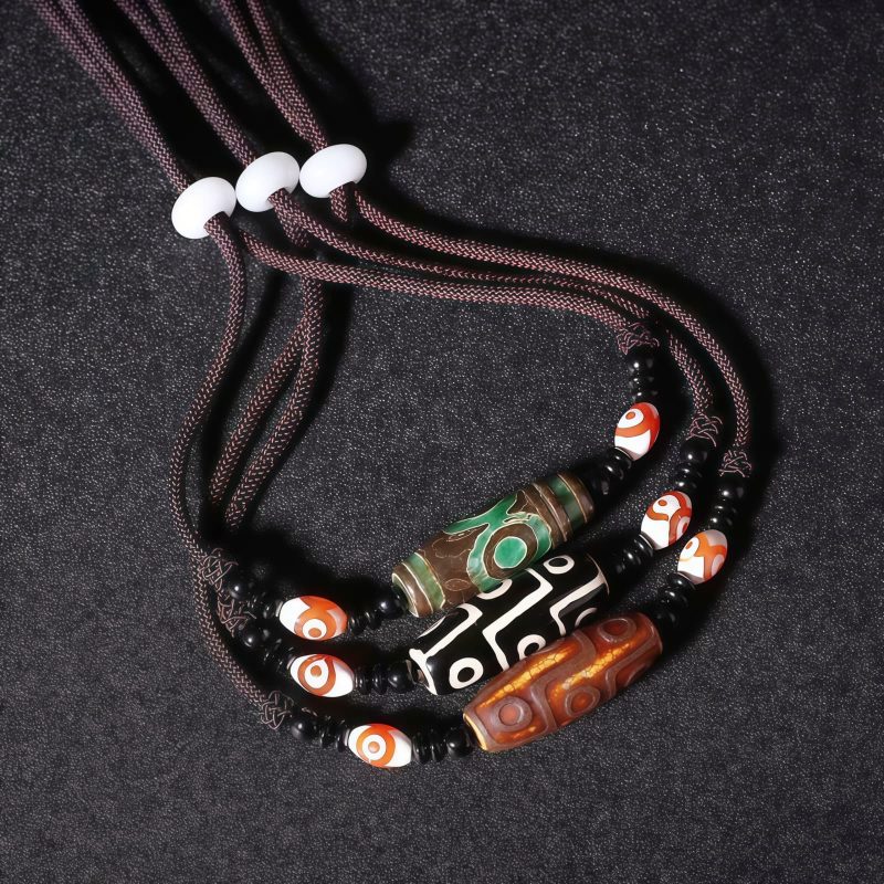 قلادة حماية من حجر dzi التبتي ذي التسع عيون Agate Tibetan Dzi Bead Protection Necklace