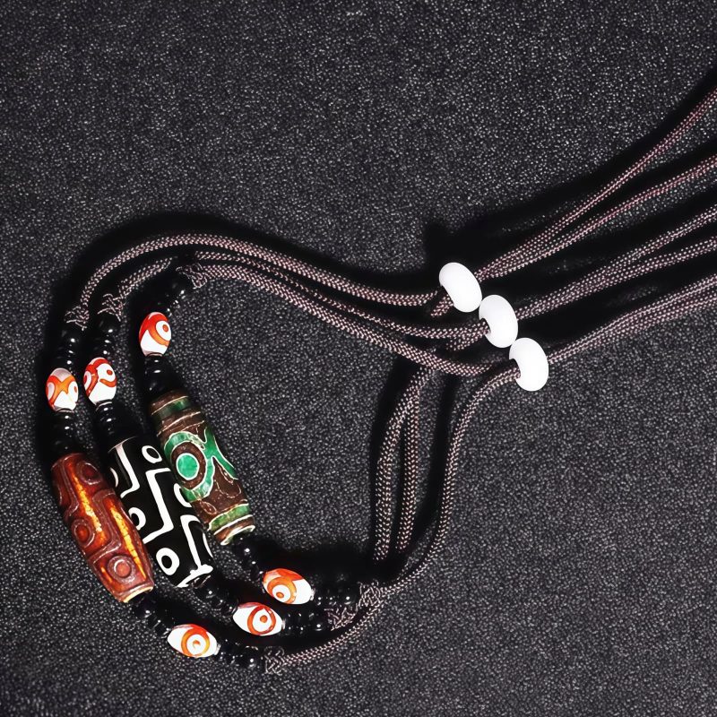 قلادة حماية من حجر dzi التبتي ذي التسع عيون Agate Tibetan Dzi Bead Protection Necklace