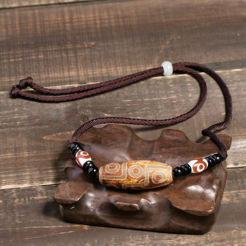 قلادة حماية من حجر dzi التبتي ذي التسع عيون Agate Tibetan Dzi Bead Protection Necklace