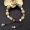 チベット三眼天珠プロテクションブレスレット Tibetan Three-Eyed Dzi Bead Protection Bracelet