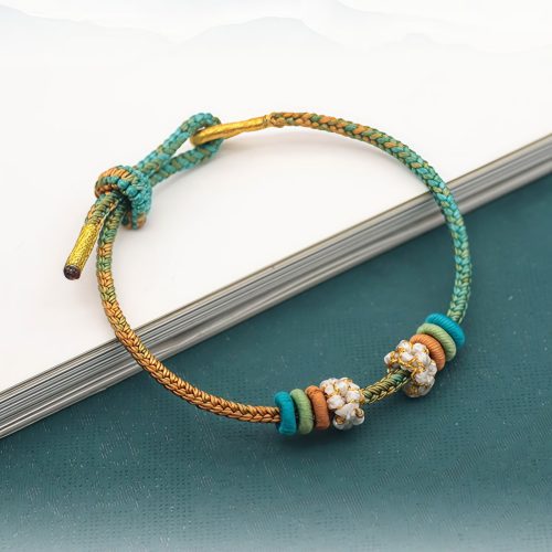 Pulsera tejida a mano con nudo de paz de ocho hilos Pulsera tejida a mano con nudo de paz de ocho hilos