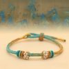 手編み八本糸平和の結び目ブレスレット Handmade Eight Thread Peace Knot Braided Bracelet
