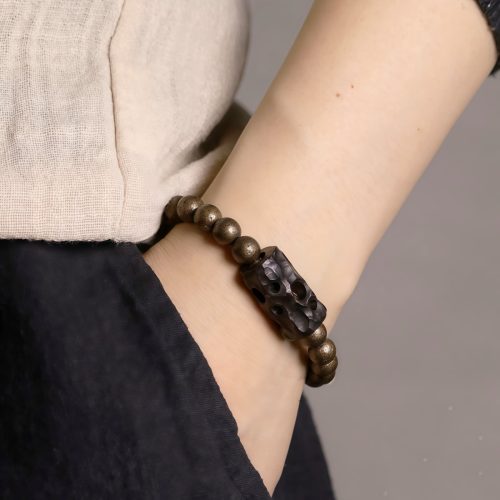 Gelang Perdamaian dari Kayu Ebony Tibet dan Tembaga Gelang Perdamaian dari Kayu Ebony Tibet dan Tembaga