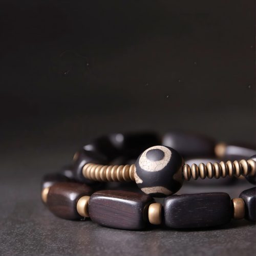 Pulsera Tibetana de Doble Vuelta con Cuentas Dzi de Madera de Ébano y Cobre Pulsera Tibetana de Doble Vuelta con Cuentas Dzi de Madera de Ébano y Cobre
