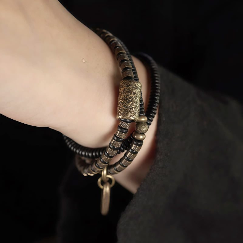 سوار يد من خشب الأبنوس التبتي والنحاس متعدد الطبقات للشفاء Tibetan Ebony Wood Beads Copper Multilayered Healing Bracelet