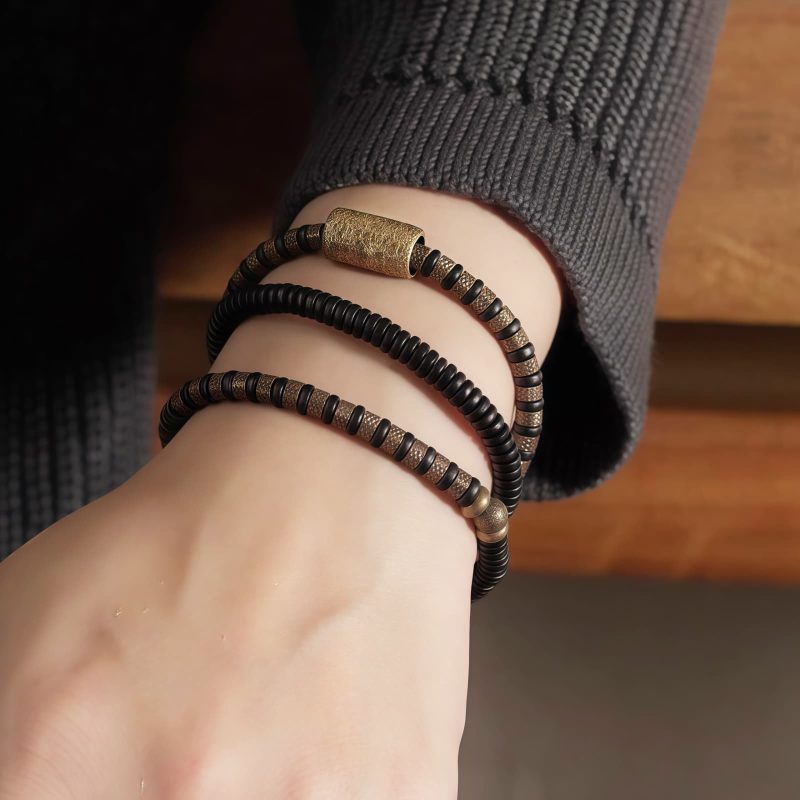 سوار يد من خشب الأبنوس التبتي والنحاس متعدد الطبقات للشفاء Tibetan Ebony Wood Beads Copper Multilayered Healing Bracelet
