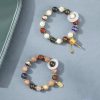 Pulsera de Rueda de Oración Tibetana con Vidrio Liuli Om Mani Padme Hum Tibetan Liuli Glass Om Mani Padme Hum Prayer Wheel Bracelet