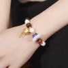 Pulsera de Rueda de Oración Tibetana con Vidrio Liuli Om Mani Padme Hum Tibetan Liuli Glass Om Mani Padme Hum Prayer Wheel Bracelet