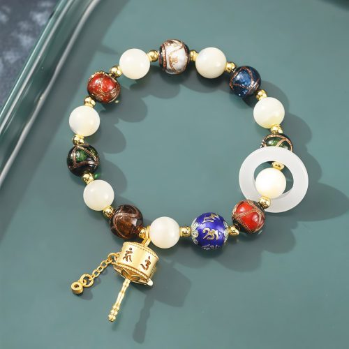 Tibetanisches Liuli-Glas Om Mani Padme Hum Gebetsmühlenarmband Tibetanisches Liuli-Glas Om Mani Padme Hum Gebetsmühlenarmband