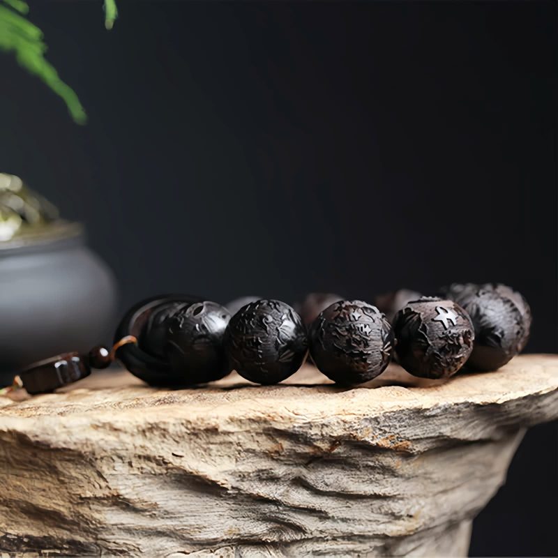 سوار يد من خشب الأبنوس المنقوش بتصميم يين ويانغ على شكل قرع Ebony Wood Yin Yang Engraved Gourd Balance Bracelet