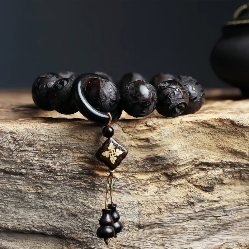 سوار يد من خشب الأبنوس المنقوش بتصميم يين ويانغ على شكل قرع Ebony Wood Yin Yang Engraved Gourd Balance Bracelet