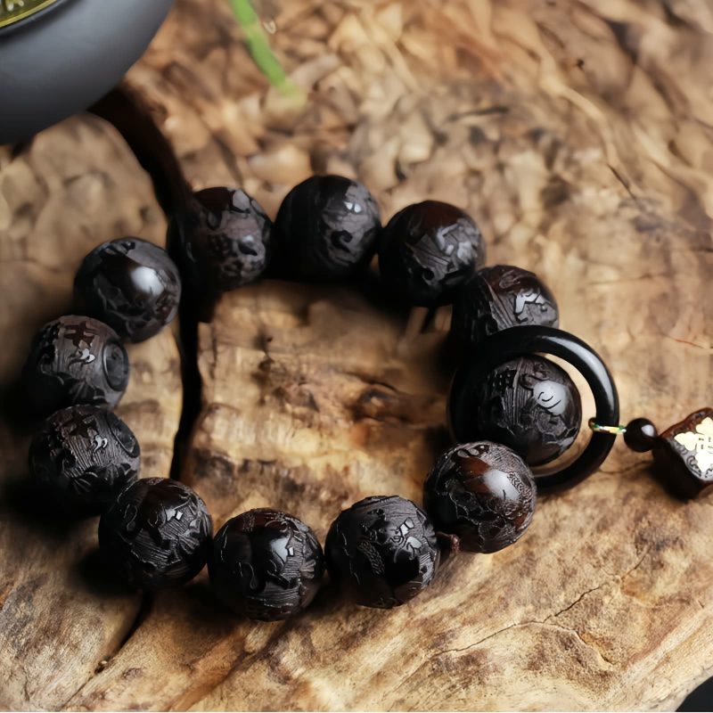 سوار يد من خشب الأبنوس المنقوش بتصميم يين ويانغ على شكل قرع Ebony Wood Yin Yang Engraved Gourd Balance Bracelet