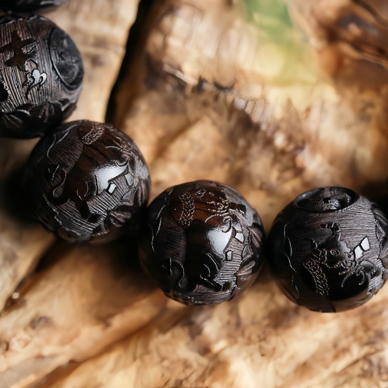سوار يد من خشب الأبنوس المنقوش بتصميم يين ويانغ على شكل قرع Ebony Wood Yin Yang Engraved Gourd Balance Bracelet