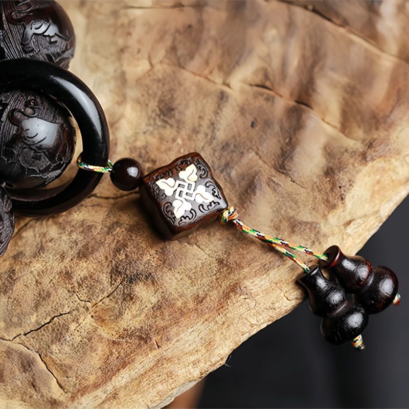 سوار يد من خشب الأبنوس المنقوش بتصميم يين ويانغ على شكل قرع Ebony Wood Yin Yang Engraved Gourd Balance Bracelet