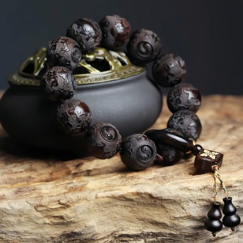 Pulsera de Equilibrio con Grabado Yin Yang en Madera de Ébano y Calabazo Pulsera de Equilibrio con Grabado Yin Yang en Madera de Ébano y Calabazo