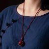 Collar con dije de cinabrio tibetano Om Mani Padme Hum Tibetan Cinnabar Om Mani Padme Hum Pendant Necklace