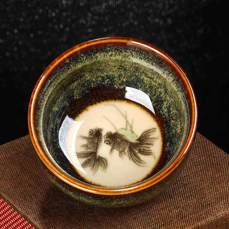 Tazón de té de cerámica Jianzhan chino con diseño de Loto, Dragón y Fénix Chinese Jianzhan Ceramic Teacup with Lotus Dragon Phoenix Design
