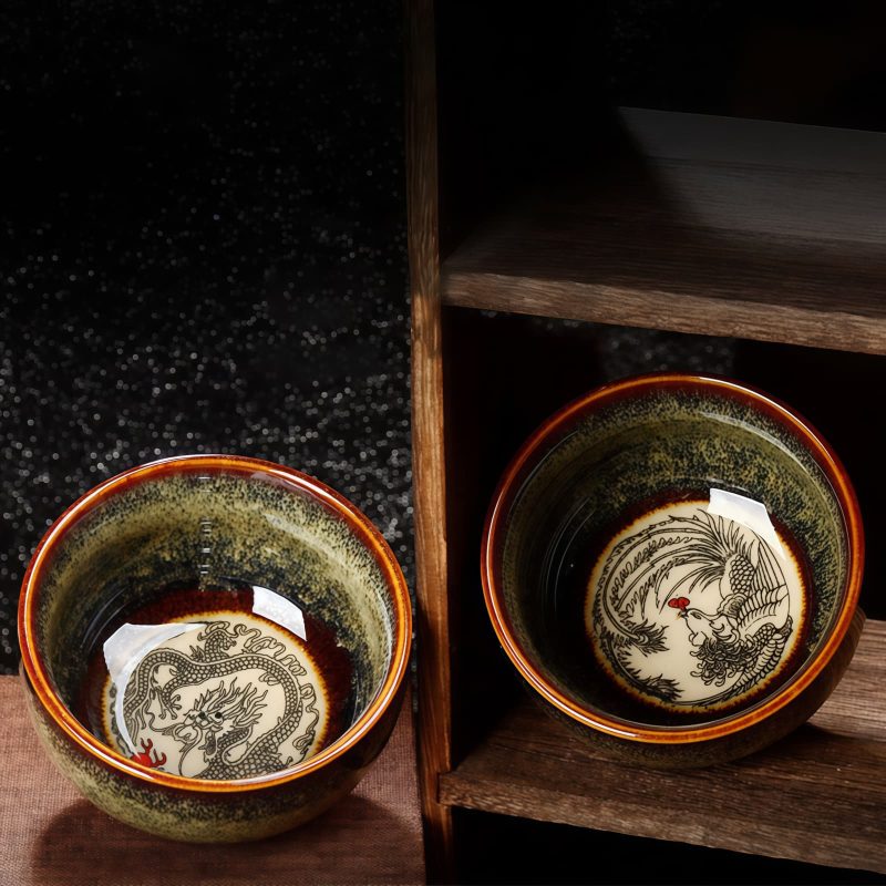 Tazón de té de cerámica Jianzhan chino con diseño de Loto, Dragón y Fénix Chinese Jianzhan Ceramic Teacup with Lotus Dragon Phoenix Design