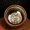 Tazón de té de cerámica Jianzhan chino con diseño de Loto, Dragón y Fénix Chinese Jianzhan Ceramic Teacup with Lotus Dragon Phoenix Design