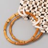 حقيبة يد من خرز الخشب المنسوج يدوياً بمقبض من الخيزران Handwoven Wooden Beads Bamboo Handle Bag