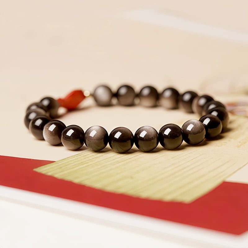 Armband aus Obsidian mit Koi-Fisch-Motiv in Silber-Schimmer Natural Silver Sheen Obsidian Koi Fish Bracelet