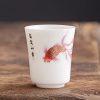 كوب شاي سيراميك أبيض مزخرف بأسماك الكوي White Ceramic Koi Fish Teacup
