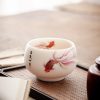 كوب شاي سيراميك أبيض مزخرف بأسماك الكوي White Ceramic Koi Fish Teacup